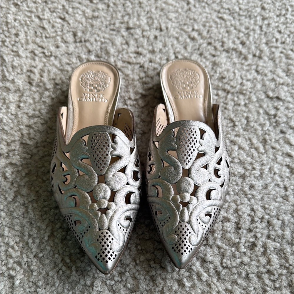Cynthia Vincent Silver Mules with Ornate Cut-Out Design